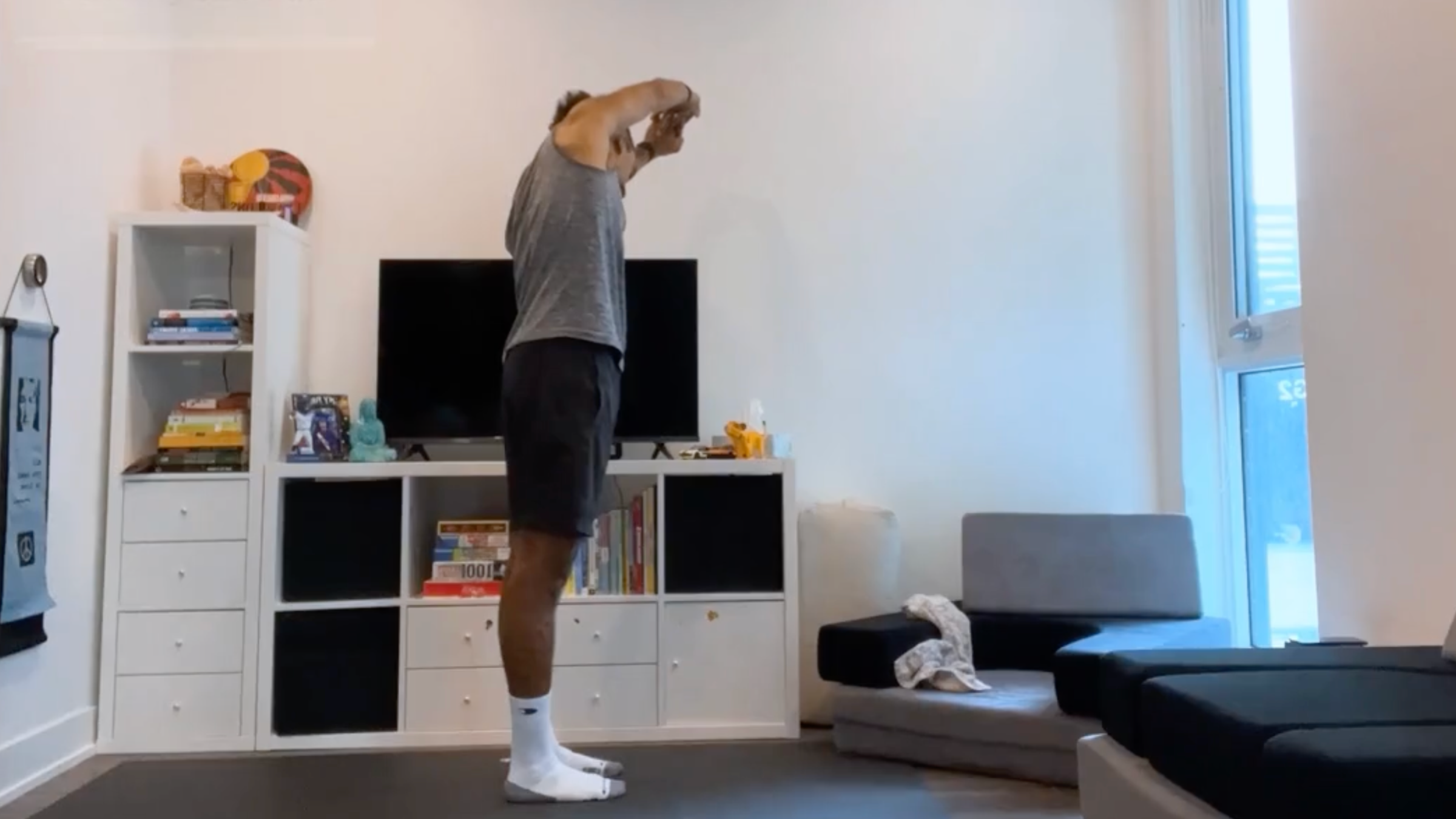 Yoga teacher Jaffer Hussain in Standing Side Bend, part of his yoga for posture practice